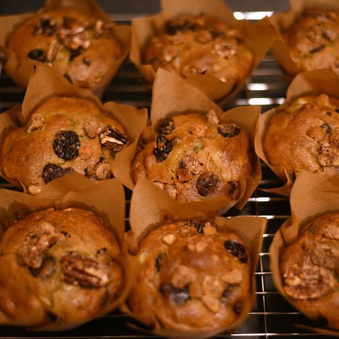 Pumpkin maple pecan muffins cooling on a rack